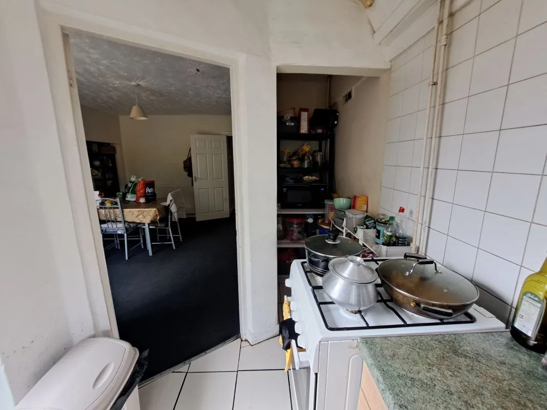 Freehold  Investment Three Bedroom Mid-Terraced House