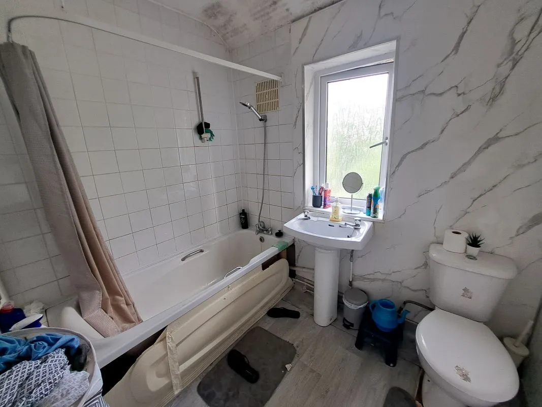 Freehold  Investment Three Bedroom Mid-Terraced House