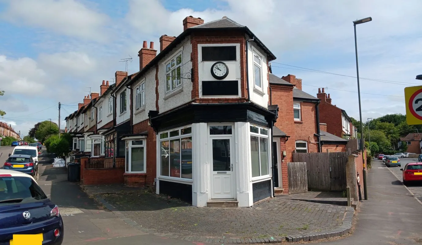 Freehold Investment - Retail Unit and Two Flats (Rental £22,200 per annum).