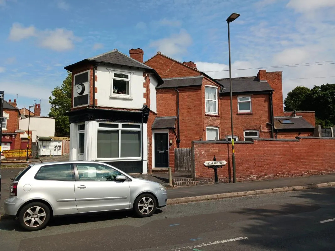 Freehold Investment - Retail Unit and Two Flats (Rental £22,200 per annum).