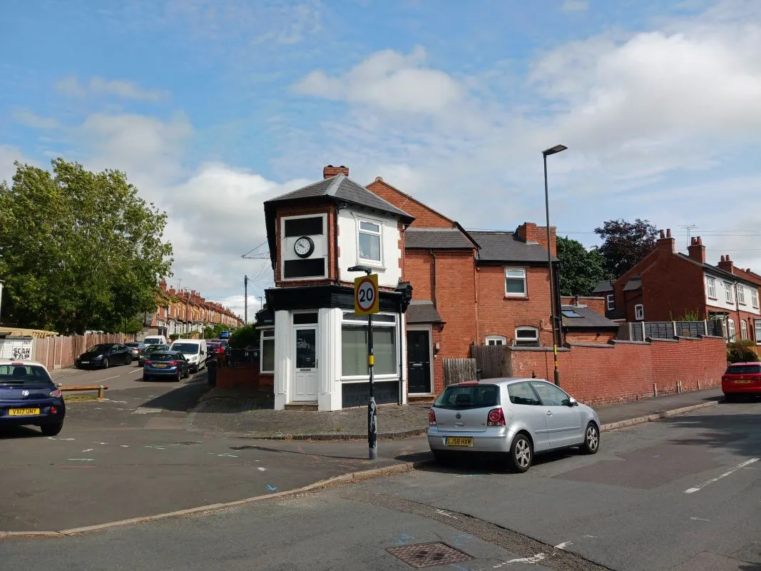 Freehold Investment - Retail Unit and Two Flats (Rental £22,200 per annum).