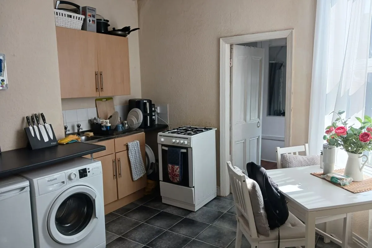 Freehold Investment - Retail Unit and Two Flats (Rental £22,200 per annum).