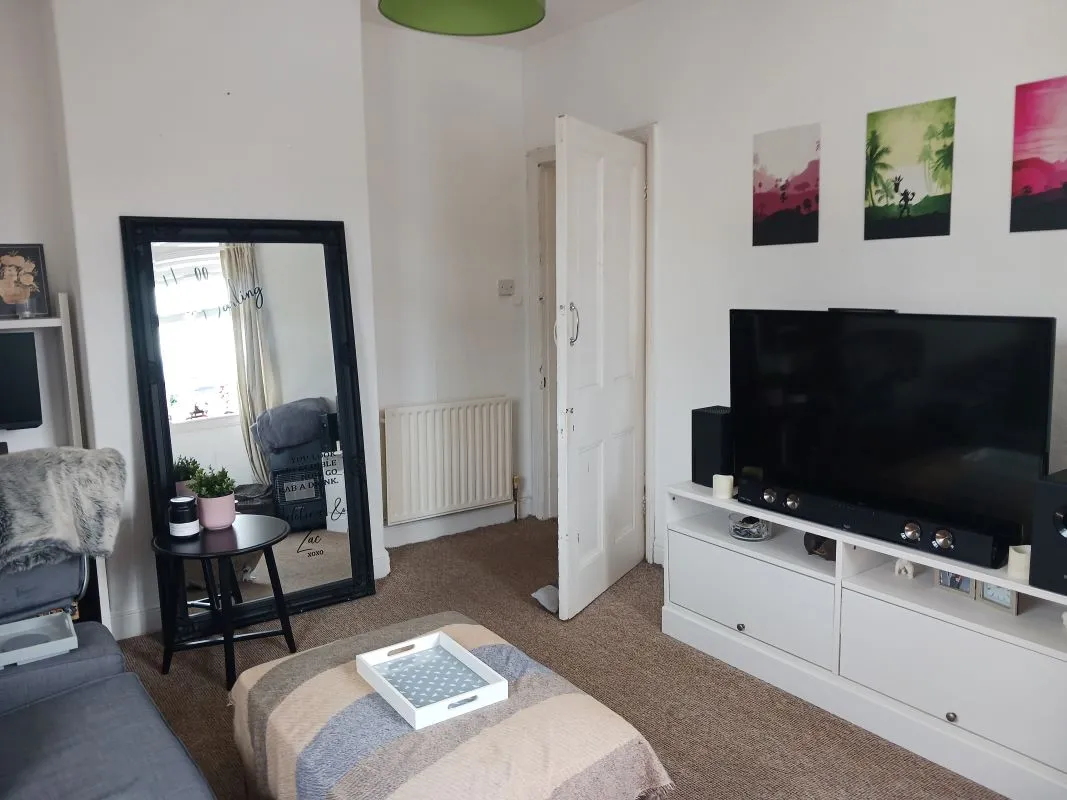 Freehold Investment - Retail Unit and Two Flats (Rental £22,200 per annum).