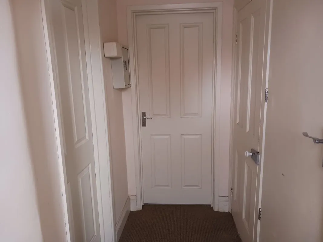 Freehold Investment - Retail Unit and Two Flats (Rental £22,200 per annum).