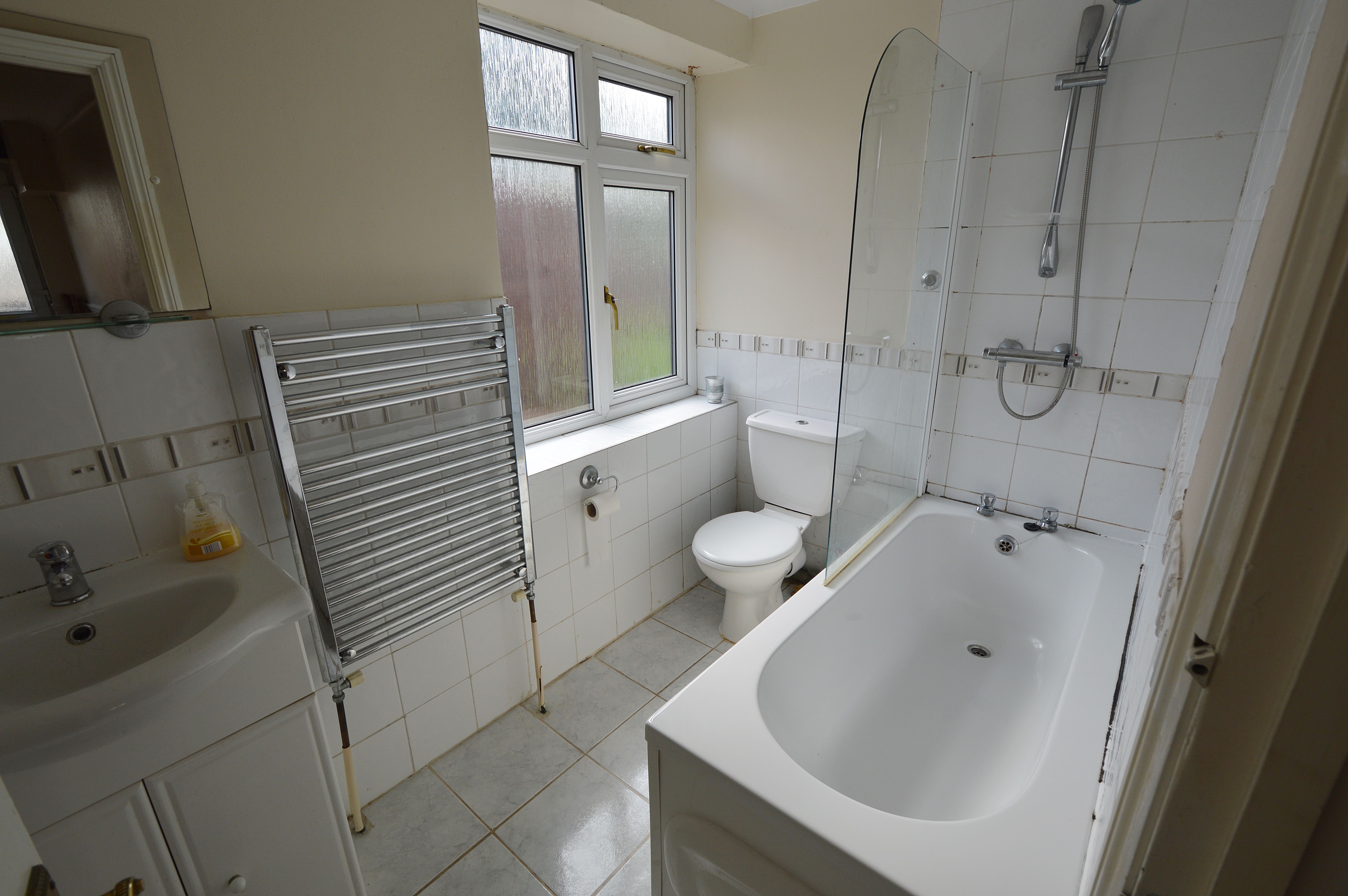RESIDENTIAL INVESTMENT: A LEASEHOLD TWO BEDROOM GROUND FLOOR APARTMENT WITH ALLOCATED OFF STREET PARKING, SUBJECT TO AN ASSURED SHORTHOLD TENANCY