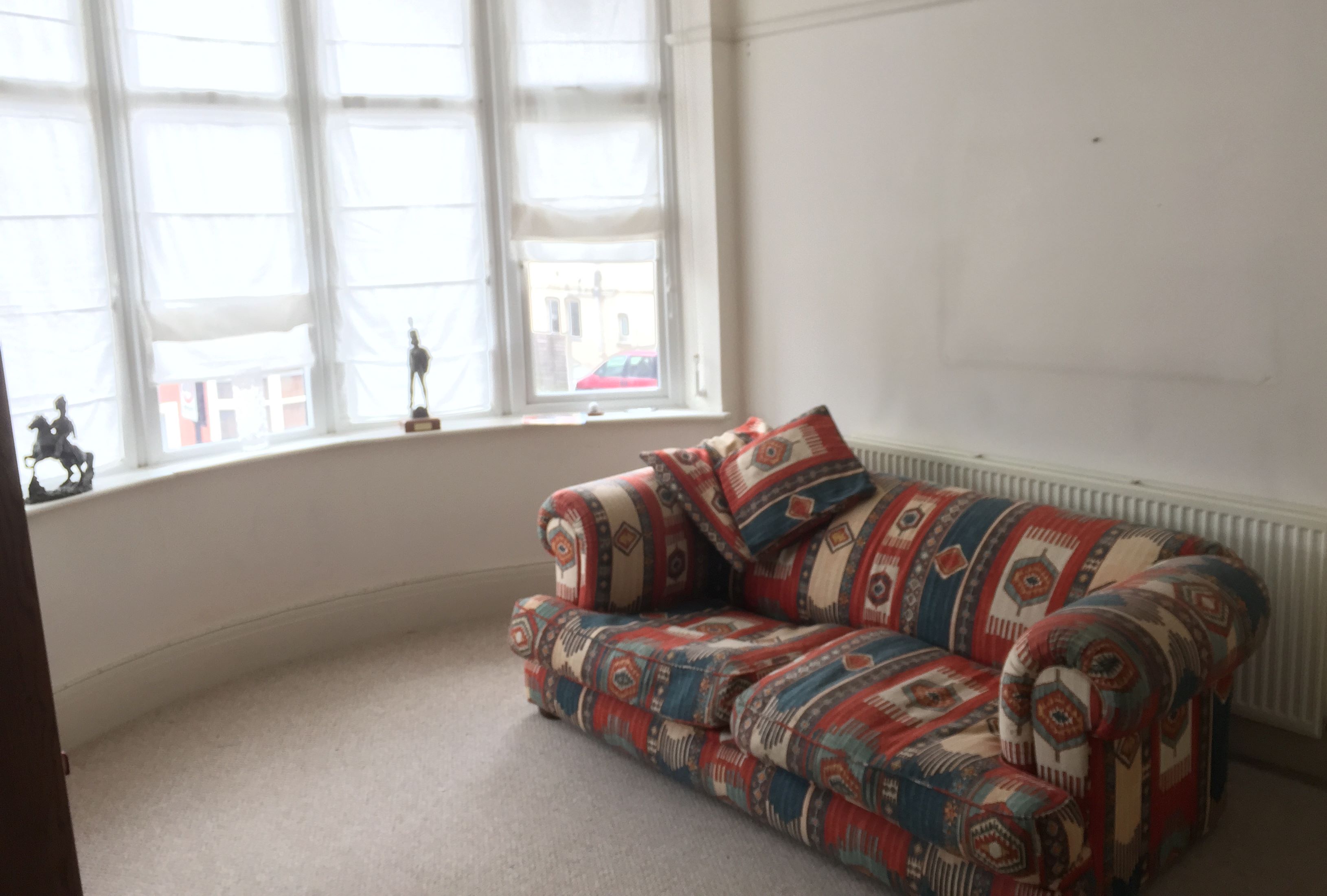 BUY TO LET OPPORTUNITY: A VACANT TWO BEDROOM FIRST FLOOR FLAT WITH THE ENTIRE FREEHOLD, INCLUDING A GARAGE AND PARKING SPACE PLUS GROUND RENT FROM GROUND FLOOR FLAT