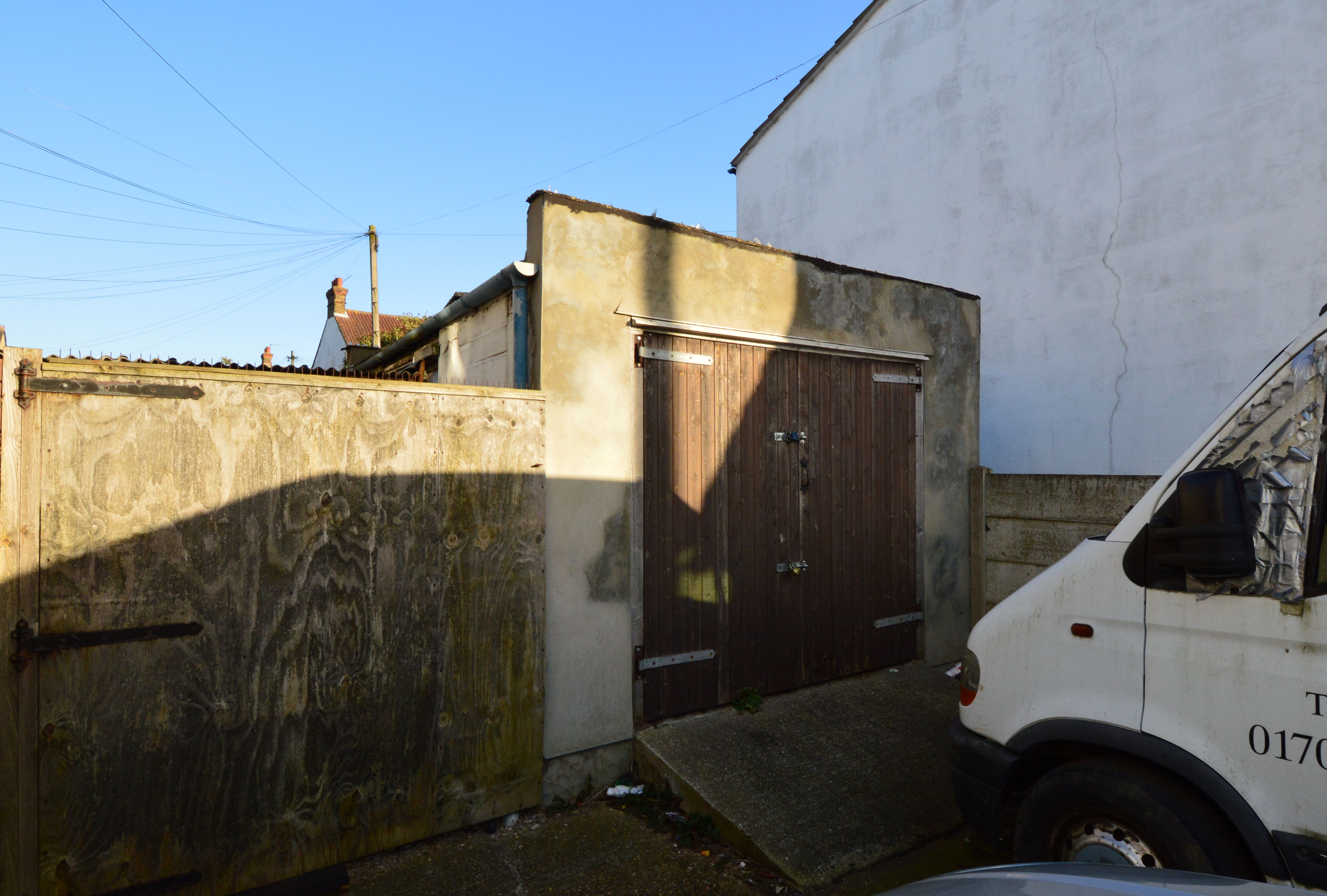 BUY TO LET OPPORTUNITY: A VACANT TWO BEDROOM FIRST FLOOR FLAT WITH THE ENTIRE FREEHOLD, INCLUDING A GARAGE AND PARKING SPACE PLUS GROUND RENT FROM GROUND FLOOR FLAT