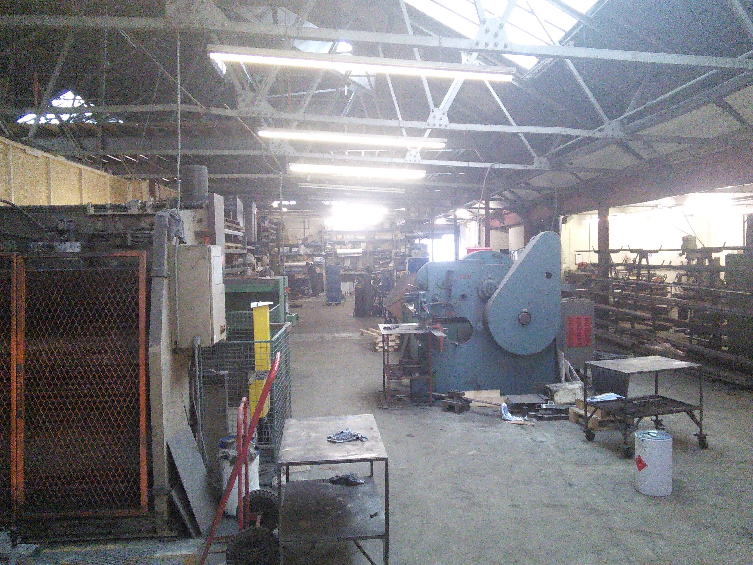 POTENTIAL FOR REDEVELOPMENT, SUBJECT TO PLANNING APPROVAL: 17,000 SQFT FREEHOLD INDUSTRIAL WAREHOUSE BUILDING ON 0.6 ACRE SITE WITH STORAGE/GARAGING TO REAR, OFFERED WITH VACANT POSSESSION ON COMPLETION