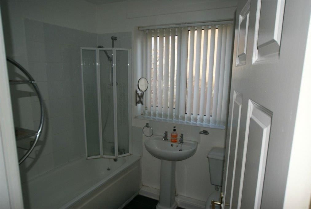 BUY TO LET INVESTMENT: A FIRST FLOOR FLAT WITH TENANT IN SITU PRODUCING AN INCOME OF £5100 PER ANNUM. A 9.3% YIELD OF THE GUIDE PRICE  