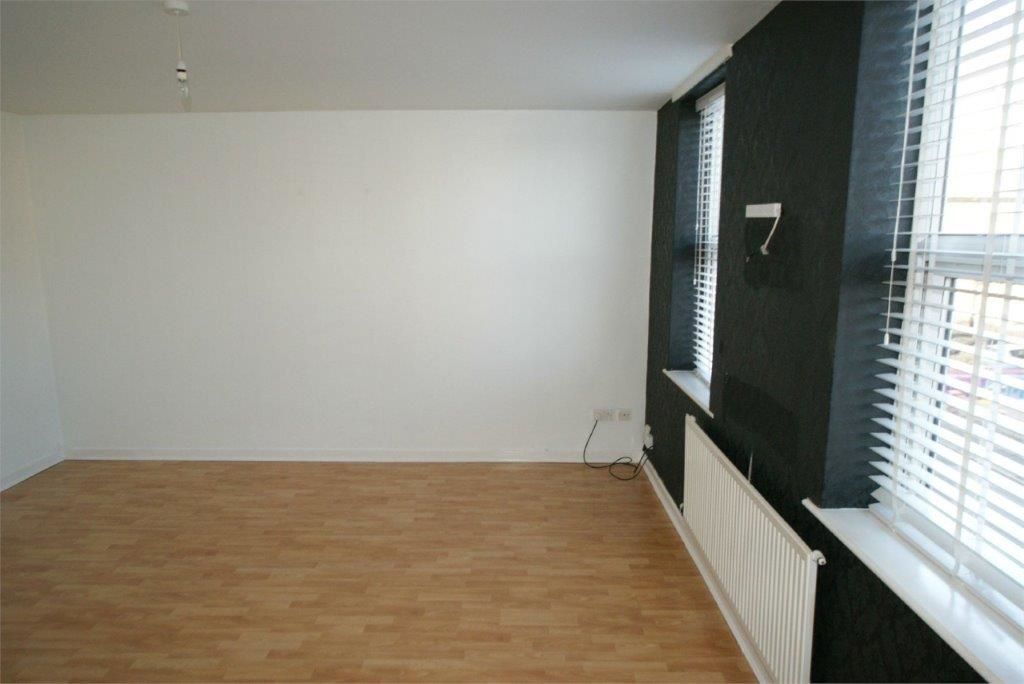 BUY TO LET INVESTMENT: A FIRST FLOOR FLAT WITH TENANT IN SITU PRODUCING AN INCOME OF £5100 PER ANNUM. A 9.3% YIELD OF THE GUIDE PRICE  