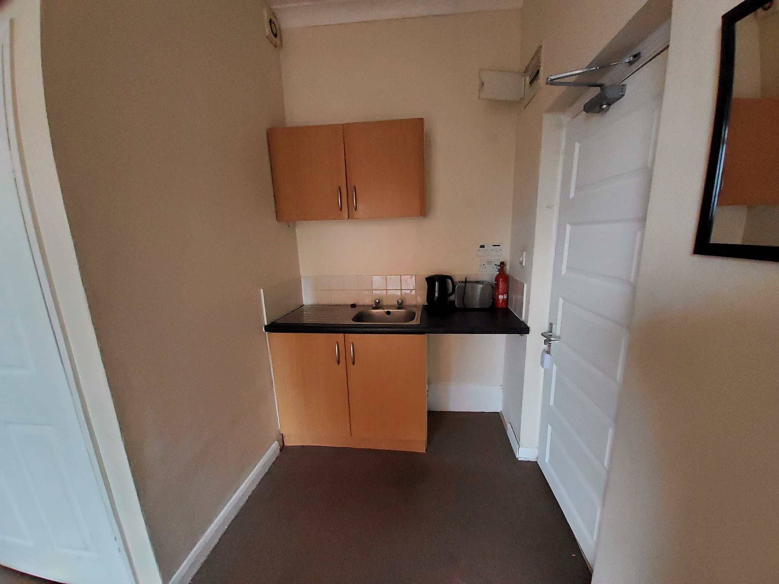 BUY TO LET INVESTMENT: A FIRST FLOOR STUDIO APARTMENT CURRENTLY PRODUCING AN INCOME OF JUST UNDER £6000 PER ANNUM.  A 10.8% YEILD OF THE GUIDE PRICE