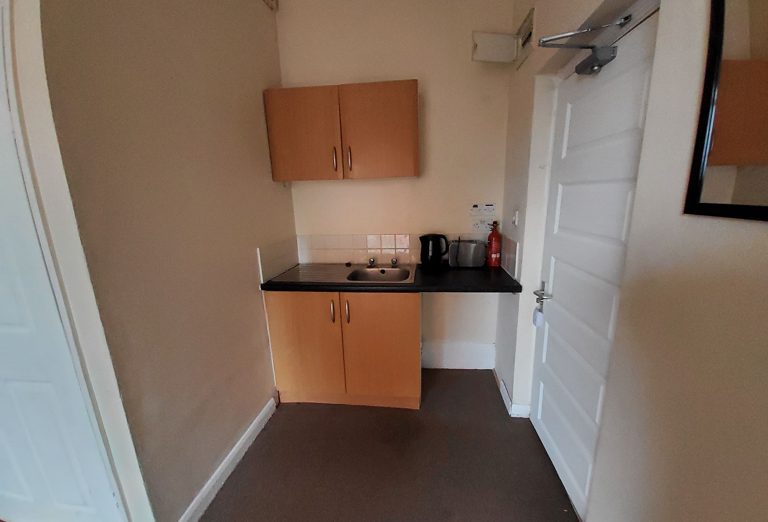 BUY TO LET INVESTMENT: A FIRST FLOOR STUDIO APARTMENT CURRENTLY PRODUCING AN INCOME OF JUST UNDER £6000 PER ANNUM.  A 10.8% YEILD OF THE GUIDE PRICE