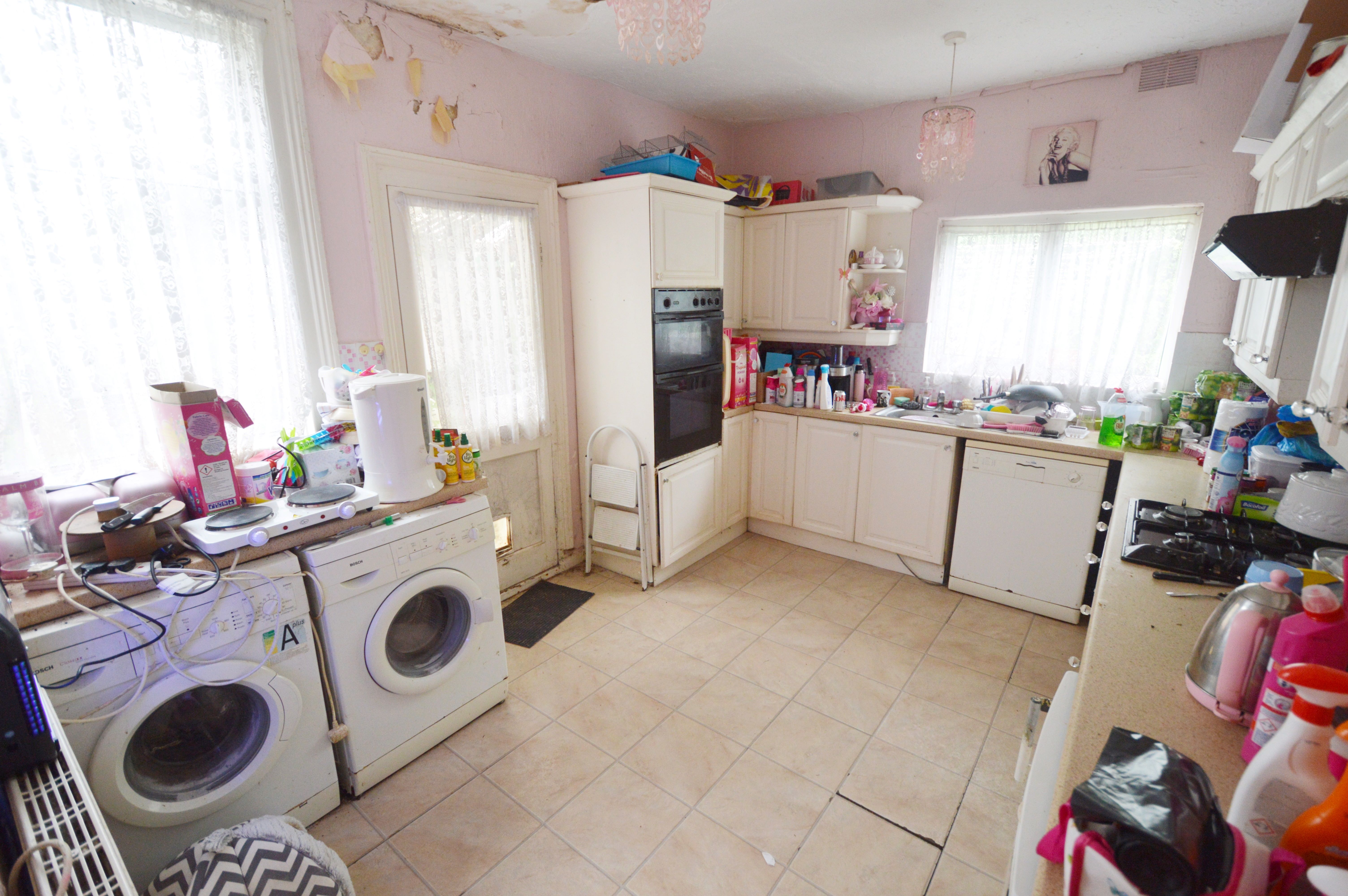 RESIDENTIAL INVESTMENT OPPORTUNITY: A FREEHOLD FOUR BEDROOM DETACHED HOUSE IN THE TOWN CENTRE IN NEED OF COMPLETE  REFURBISHMENT
