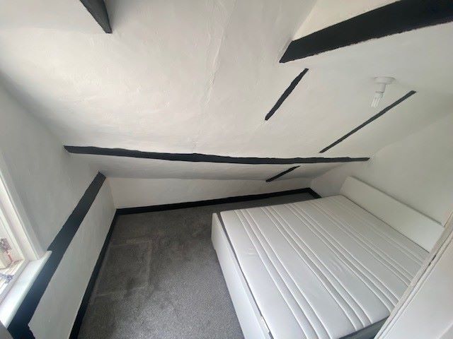 MIXED USE PROPERTY: A VACANT FREEHOLD GRADE II LISTED BUILDING COMPRISING OF A GROUND FLOOR FORMER OPTICIANS AND SPLIT LEVEL APARTMENT ABOVE.