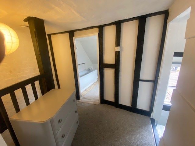 MIXED USE PROPERTY: A VACANT FREEHOLD GRADE II LISTED BUILDING COMPRISING OF A GROUND FLOOR FORMER OPTICIANS AND SPLIT LEVEL APARTMENT ABOVE.