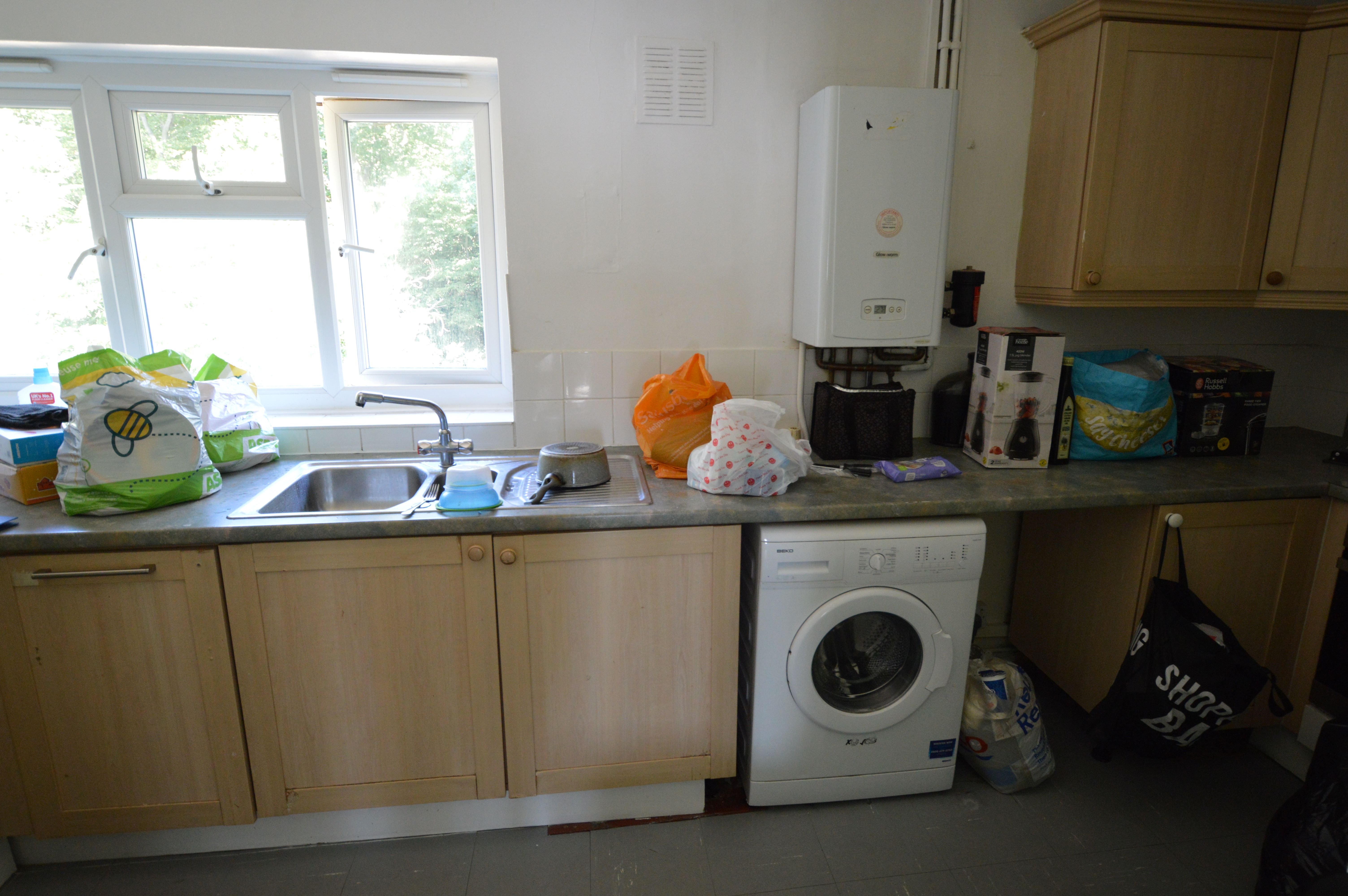 RESIDENTIAL INVESTMENT OPPORTUNITY:  A VACANT TWO BEDROOM SECOND FLOOR FLAT WITH OWN GARDEN CONSIDERED TO BE BELOW MARKET VALUE