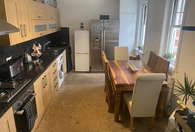 BUY TO LET INVESTMENT: A SPACIOUS TWO BEDROOM TWO BATHROOM FIRST FLOOR APARTMENT WITH LONG LEASE AND TENANT IN OCCUPATION.