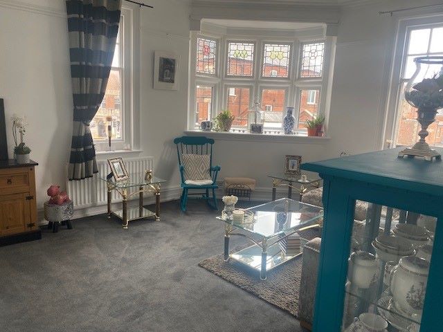 BUY TO LET INVESTMENT: A SPACIOUS TWO BEDROOM TWO BATHROOM FIRST FLOOR APARTMENT WITH LONG LEASE AND TENANT IN OCCUPATION.