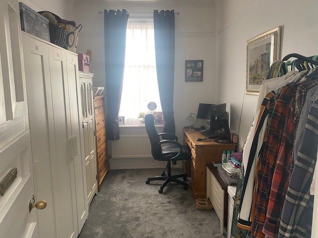BUY TO LET INVESTMENT: A SPACIOUS TWO BEDROOM TWO BATHROOM FIRST FLOOR APARTMENT WITH LONG LEASE AND TENANT IN OCCUPATION.