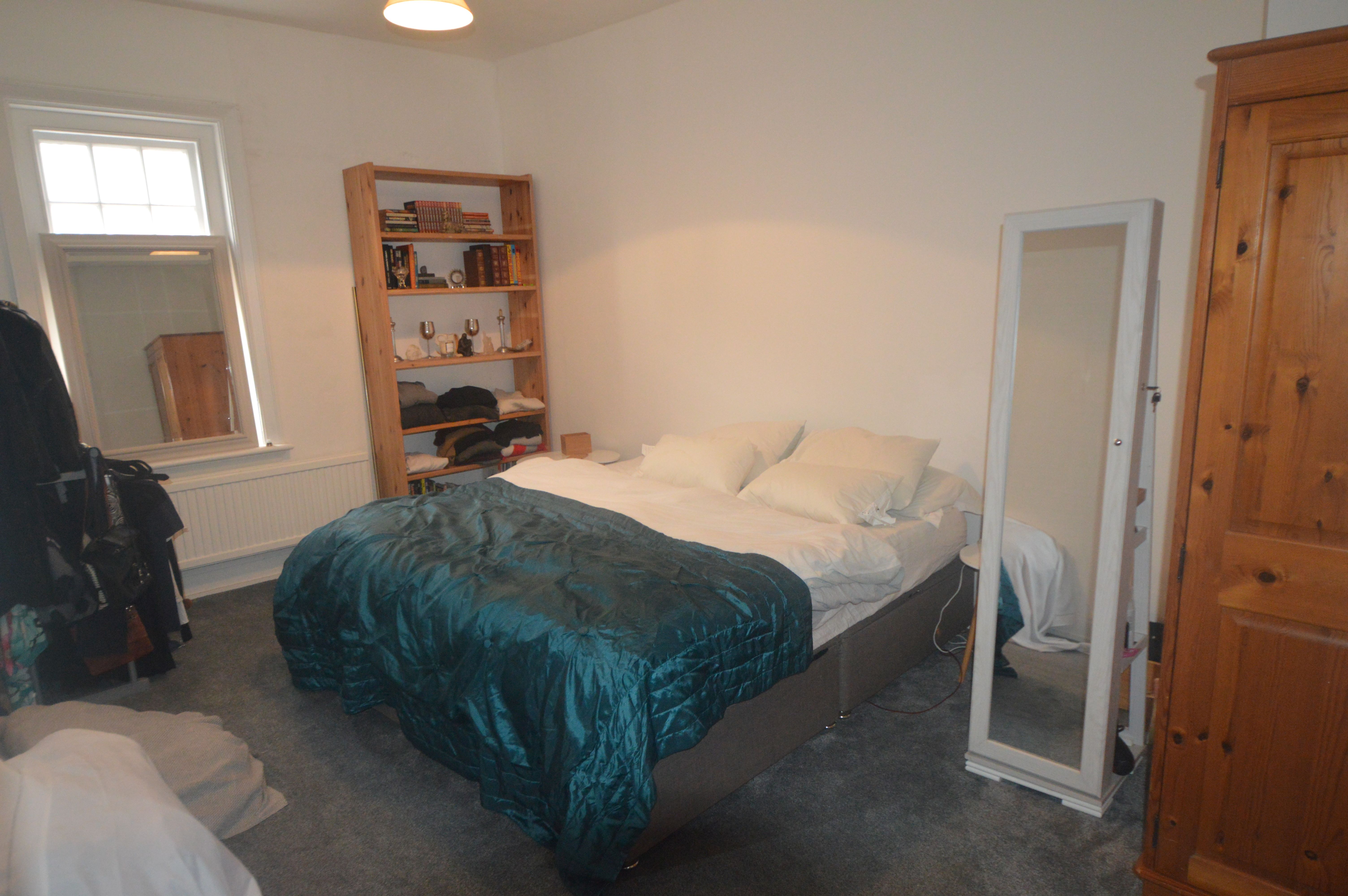 BUY TO LET INVESTMENT: A THREE BEDROOM FIRST FLOOR APARTMENT WITH TENANT IN OCCUPATION CURRENTLY ACHIEVING AN INCOME OF £9000 PER ANNUM