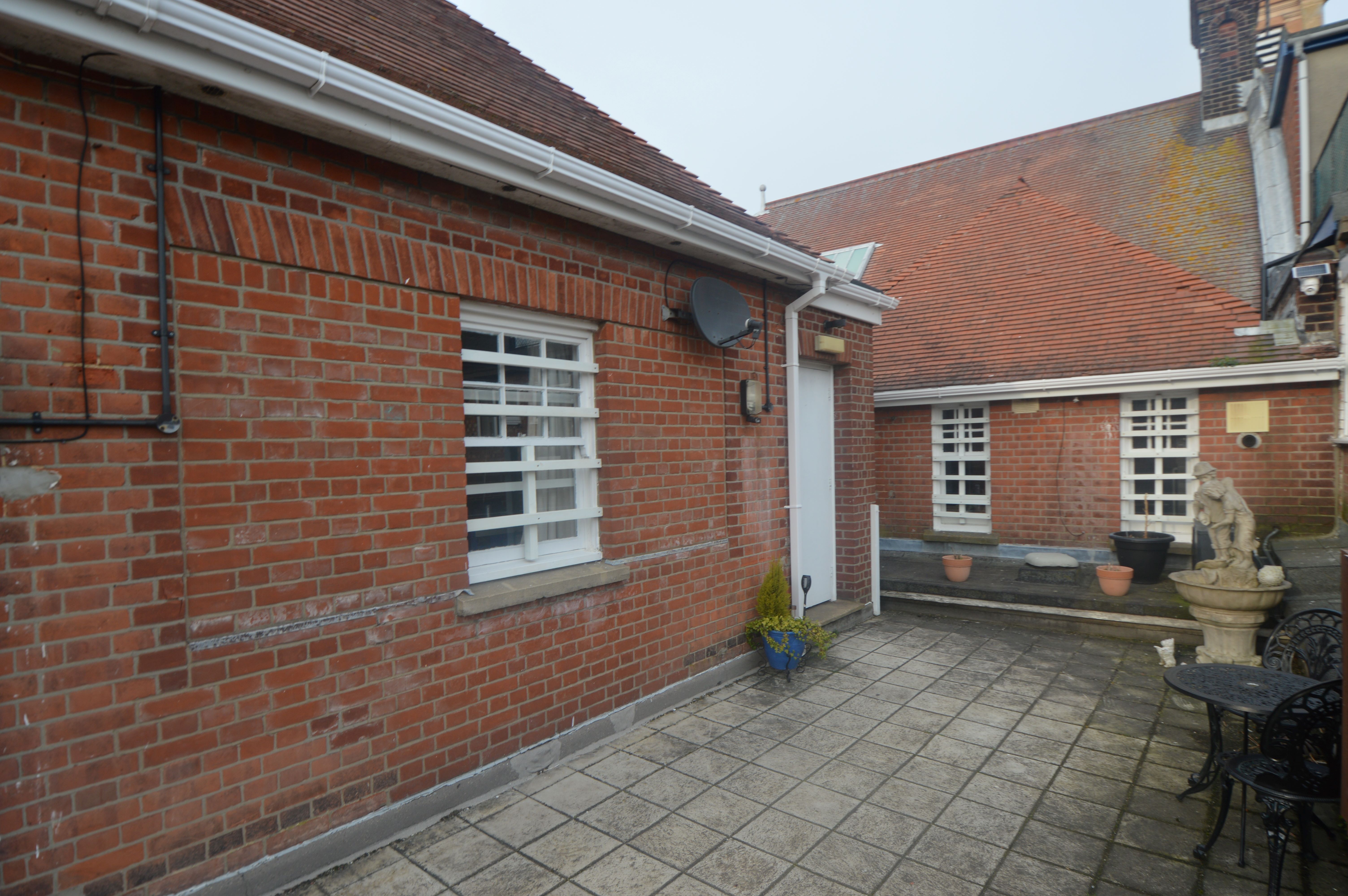 BUY TO LET INVESTMENT: A THREE BEDROOM FIRST FLOOR APARTMENT WITH TENANT IN OCCUPATION CURRENTLY ACHIEVING AN INCOME OF £9000 PER ANNUM