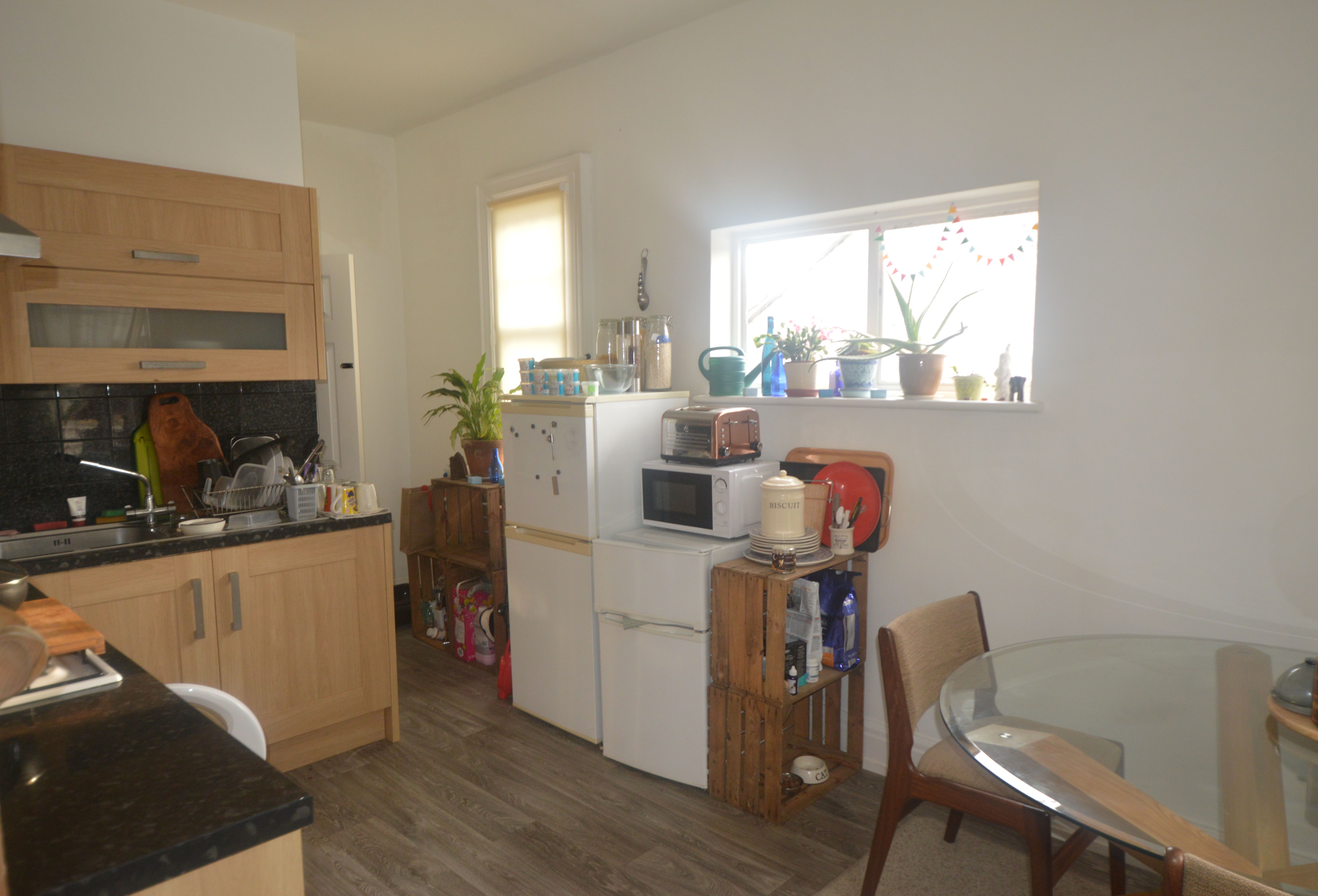 BUY TO LET INVESTMENT: A THREE BEDROOM FIRST FLOOR APARTMENT WITH TENANT IN OCCUPATION CURRENTLY ACHIEVING AN INCOME OF £9000 PER ANNUM