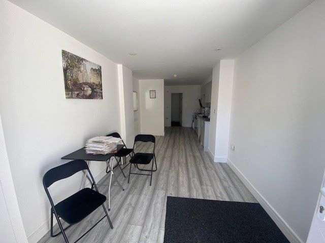 MIXED USE INVESTMENT A FREEHOLD FOOD TAKEAWAY WITH STUDIO FLAT FULLY LET FOR £16,000 PA PLUS GROUND RENT FROM FIRST FLOOR FLAT SOLD ON LONG LEASE.