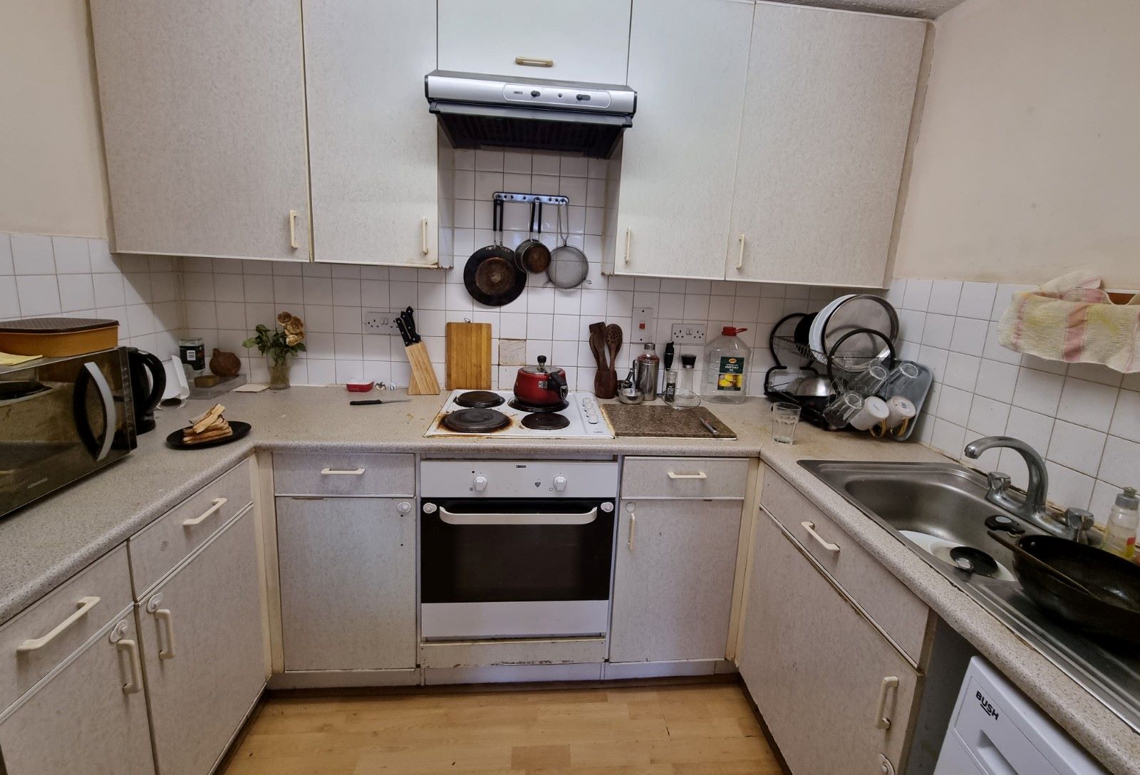 BUY TO LET INVESTMENT: A SECOND FLOOR FLAT CLOSE TO THE TRAIN STATION WITH A TENANT IN OCCUPATION PRODUCING AN INCOME OF £13,200 PER ANNUM