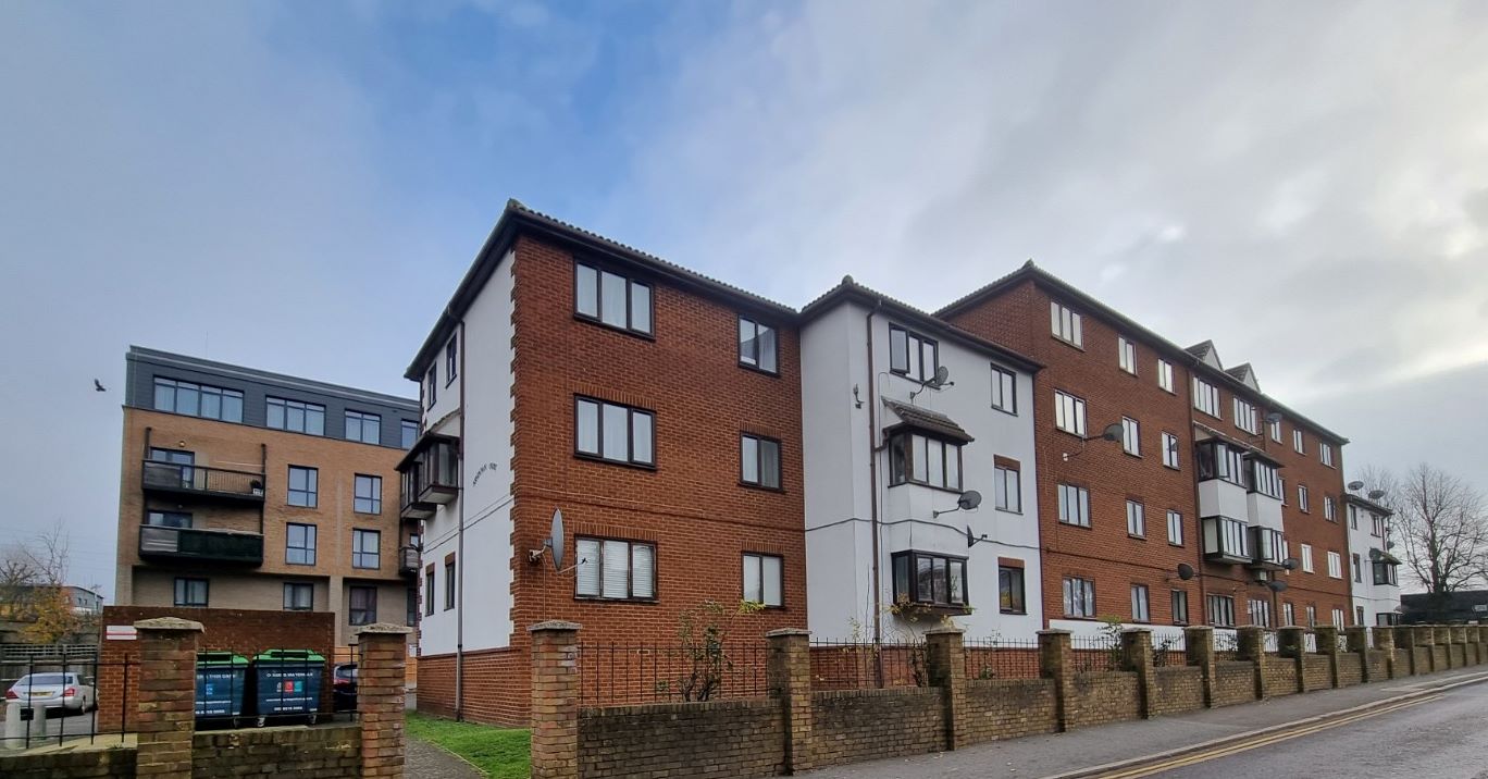 BUY TO LET INVESTMENT: A SECOND FLOOR FLAT CLOSE TO THE TRAIN STATION WITH A TENANT IN OCCUPATION PRODUCING AN INCOME OF £13,200 PER ANNUM