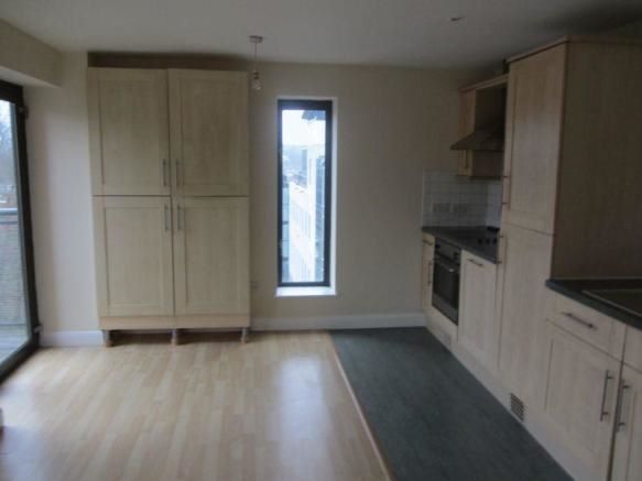 BUY TO LET INVESTMENT: A FOURTH FLOOR APARTMENT CLOSE TO THE CITY CENTRE WITH A TENANT IN OCCUPATION PRODUCING AN INCOME OF £7,140 PER ANNUM
