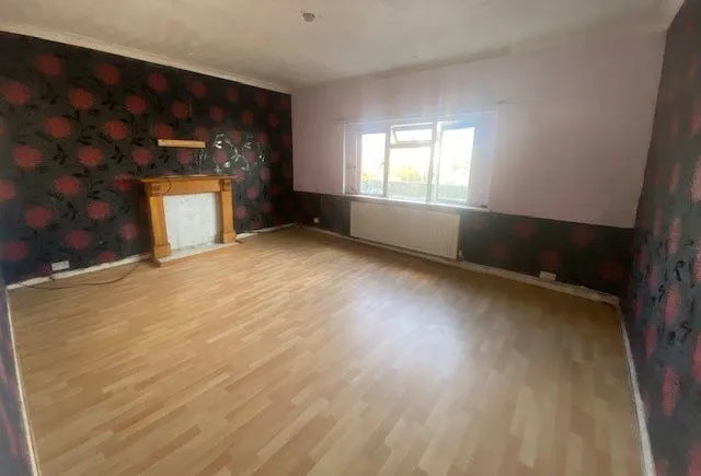 MIXED USE INVESTMENT: A PART LET DETACHED BUILDING WITH 2 GROUND FLOOR COMMERCIAL UNITS AND A RESIDENTIAL FLAT ABOVE AND BUILDERS YARD TO REAR