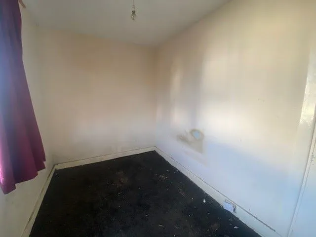 MIXED USE INVESTMENT: A PART LET DETACHED BUILDING WITH 2 GROUND FLOOR COMMERCIAL UNITS AND A RESIDENTIAL FLAT ABOVE AND BUILDERS YARD TO REAR