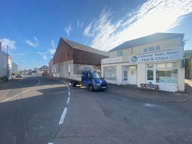 MIXED USE INVESTMENT: A PART LET DETACHED BUILDING WITH 2 GROUND FLOOR COMMERCIAL UNITS AND A RESIDENTIAL FLAT ABOVE AND BUILDERS YARD TO REAR