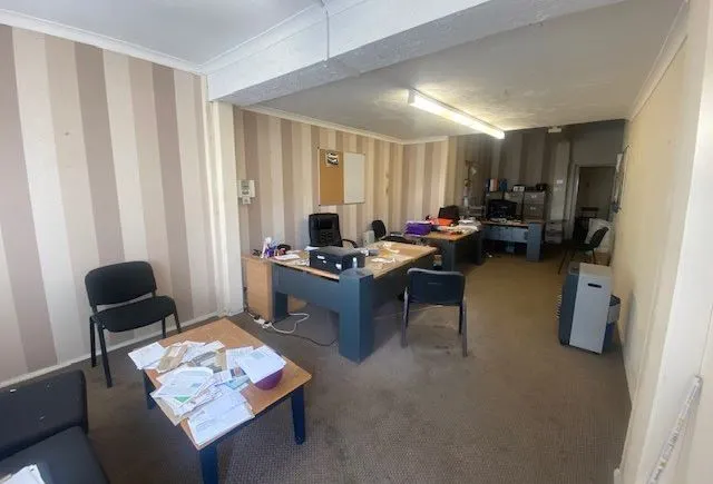 MIXED USE INVESTMENT: A PART LET DETACHED BUILDING WITH 2 GROUND FLOOR COMMERCIAL UNITS AND A RESIDENTIAL FLAT ABOVE AND BUILDERS YARD TO REAR