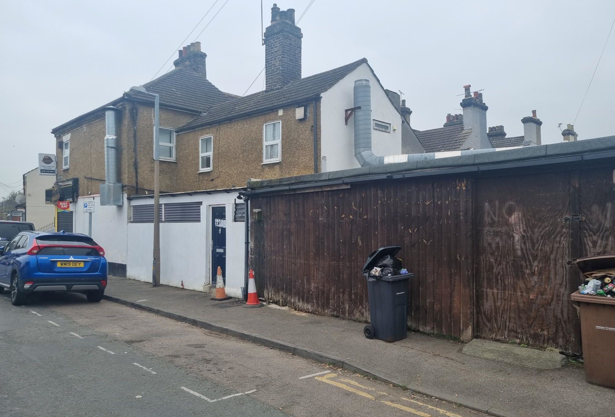 MIXED USE INVESTMENT: A FREEHOLD BUILDING COMPRISING A COMMERCIAL SHOP AND THREE FLATS LOCATED IN GRAYS PRODUCING AN ANNUAL INCOME OF £37,200