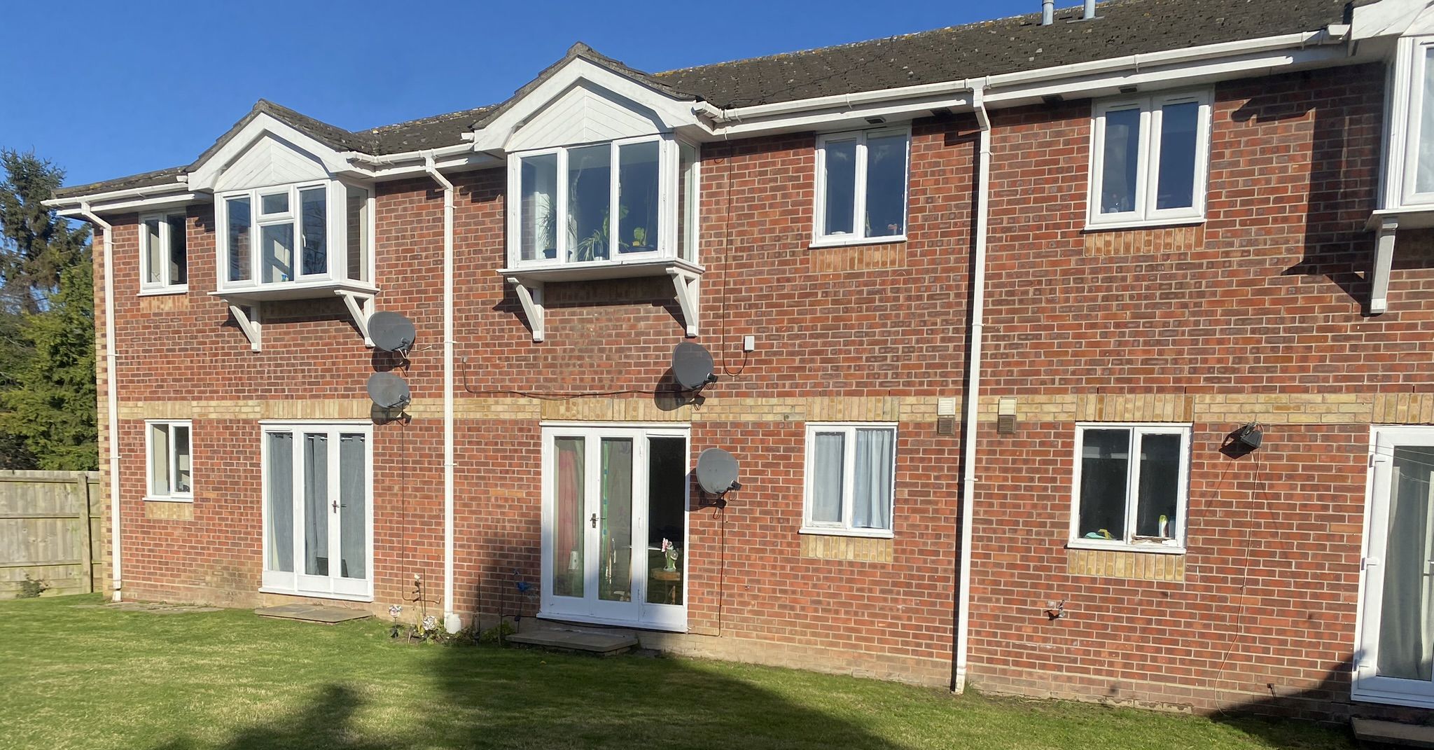 BUY TO LET INVESTMENT: A  LEASEHOLD TWO BEDROOM GROUND FLOOR FLAT CURRENTLY LET AND PRODUCING AN INCOME OF £8,700 PER ANNUM