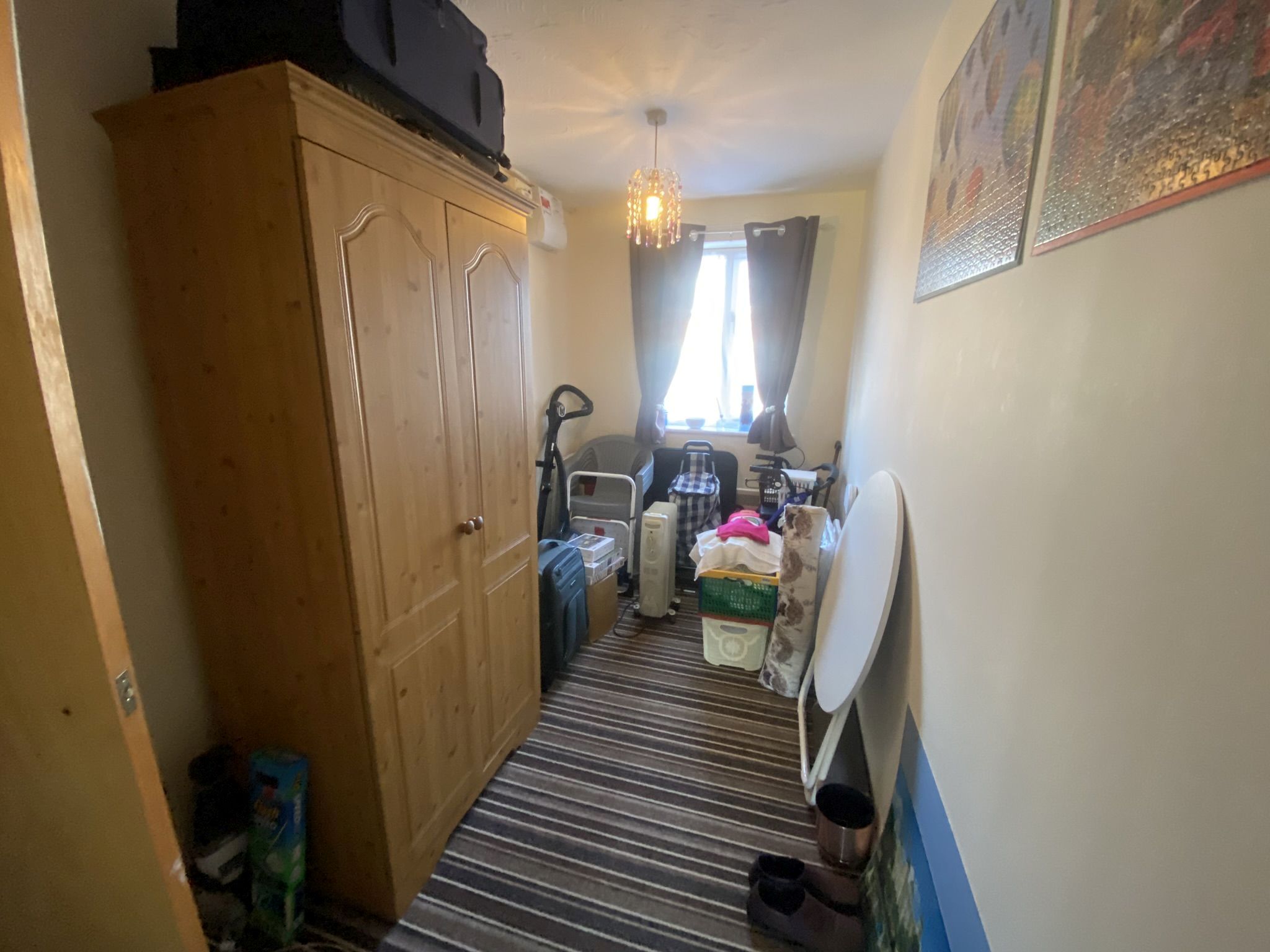 BUY TO LET INVESTMENT: A  LEASEHOLD TWO BEDROOM GROUND FLOOR FLAT CURRENTLY LET AND PRODUCING AN INCOME OF £8,700 PER ANNUM