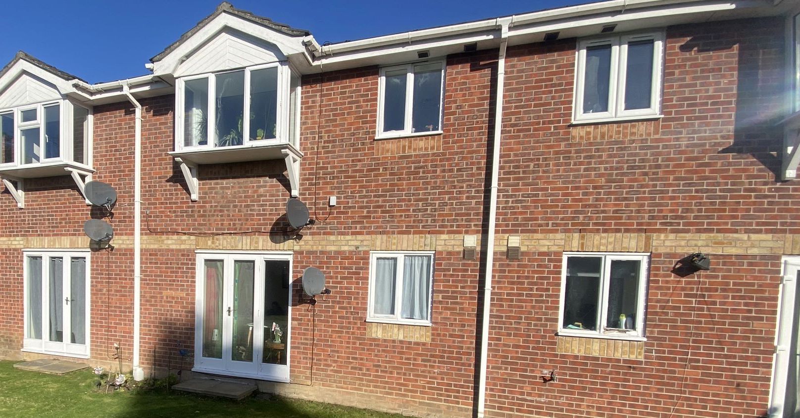 BUY TO LET INVESTMENT: A  LEASEHOLD TWO BEDROOM GROUND FLOOR FLAT CURRENTLY LET AND PRODUCING AN INCOME OF £8,700 PER ANNUM