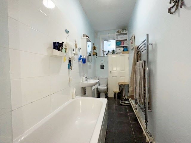 RESIDENTIAL OPPORTUNITY: A SUBSTANTIAL FREEHOLD PROPERTY ARRANGED AS THREE FLATS OFFERING HUGE POTENTIAL FOR RE-CONFIGURATION/RE-DEVELOPMENT