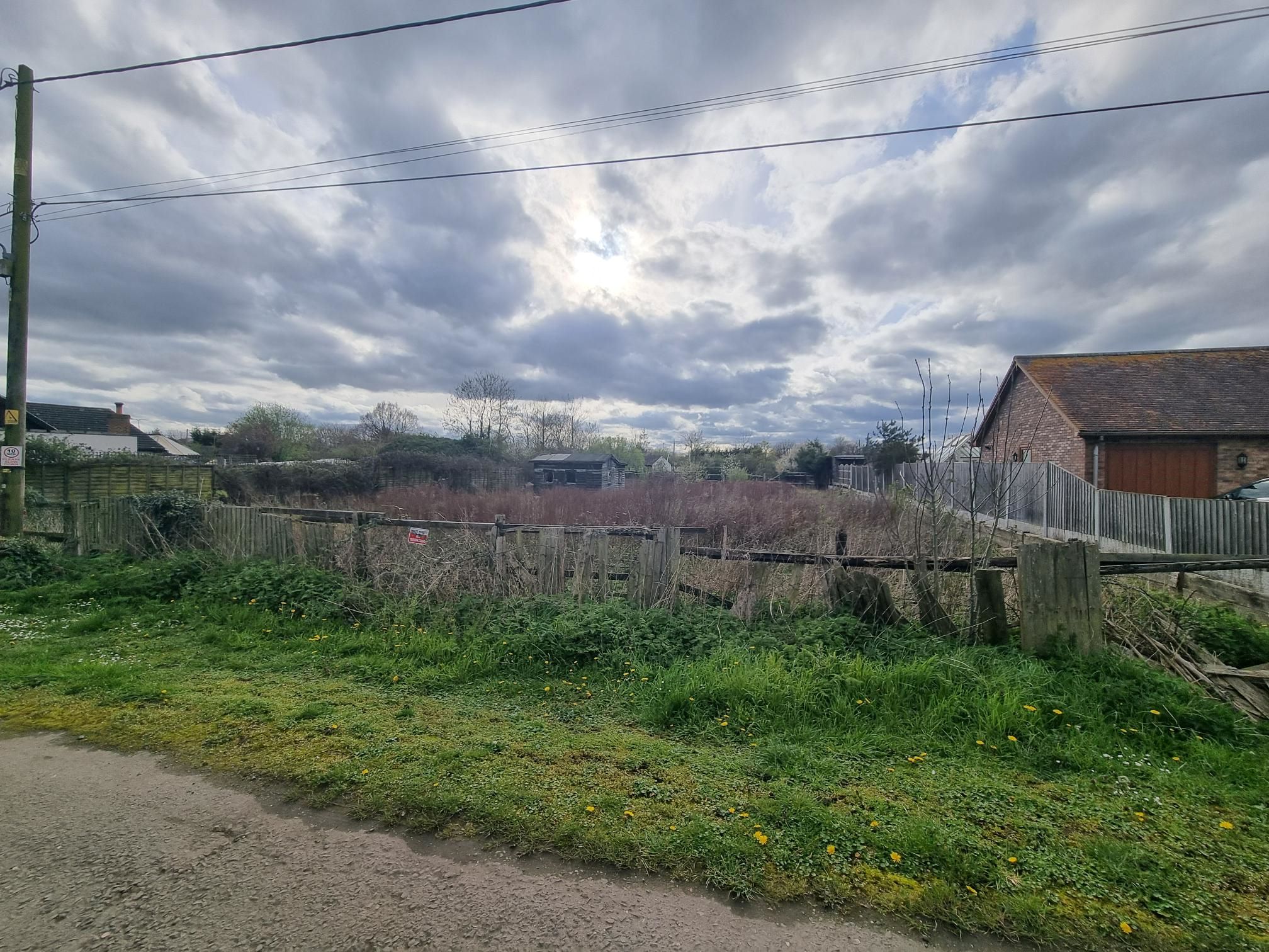 LAND INVESTMENT: A FREEHOLD PARCEL OF LAND IN A SEMI RURAL LOCATION CONSIDERED TO HAVE DEVELOPMENT POTENTIAL SUBJECT TO PLANNING CONSENT