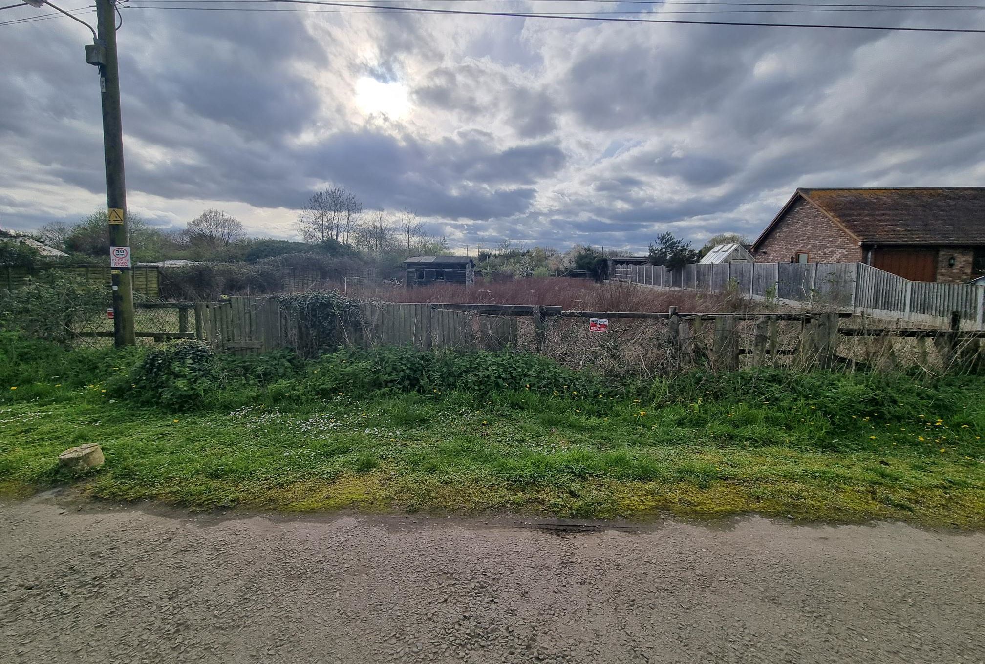 LAND INVESTMENT: A FREEHOLD PARCEL OF LAND IN A SEMI RURAL LOCATION CONSIDERED TO HAVE DEVELOPMENT POTENTIAL SUBJECT TO PLANNING CONSENT