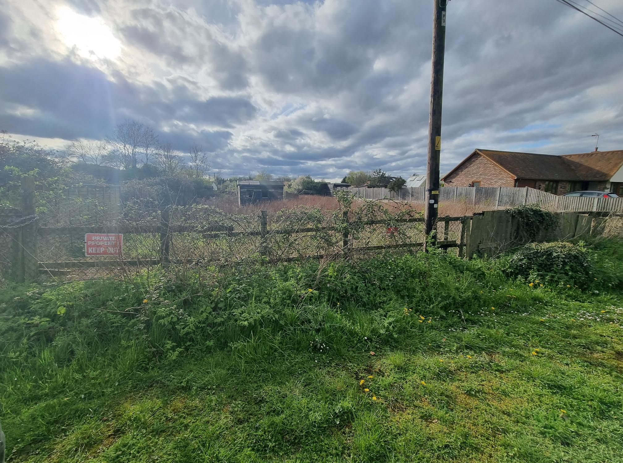 LAND INVESTMENT: A FREEHOLD PARCEL OF LAND IN A SEMI RURAL LOCATION CONSIDERED TO HAVE DEVELOPMENT POTENTIAL SUBJECT TO PLANNING CONSENT