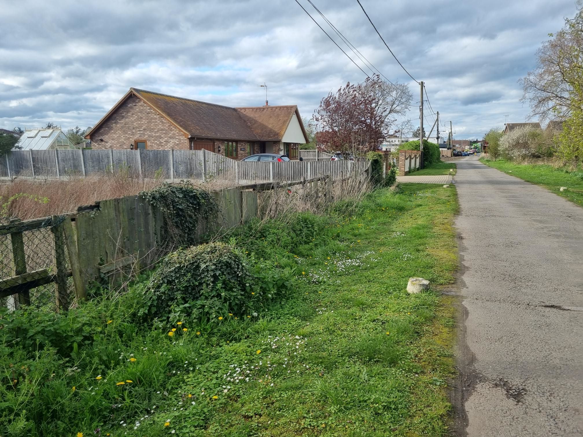 LAND INVESTMENT: A FREEHOLD PARCEL OF LAND IN A SEMI RURAL LOCATION CONSIDERED TO HAVE DEVELOPMENT POTENTIAL SUBJECT TO PLANNING CONSENT