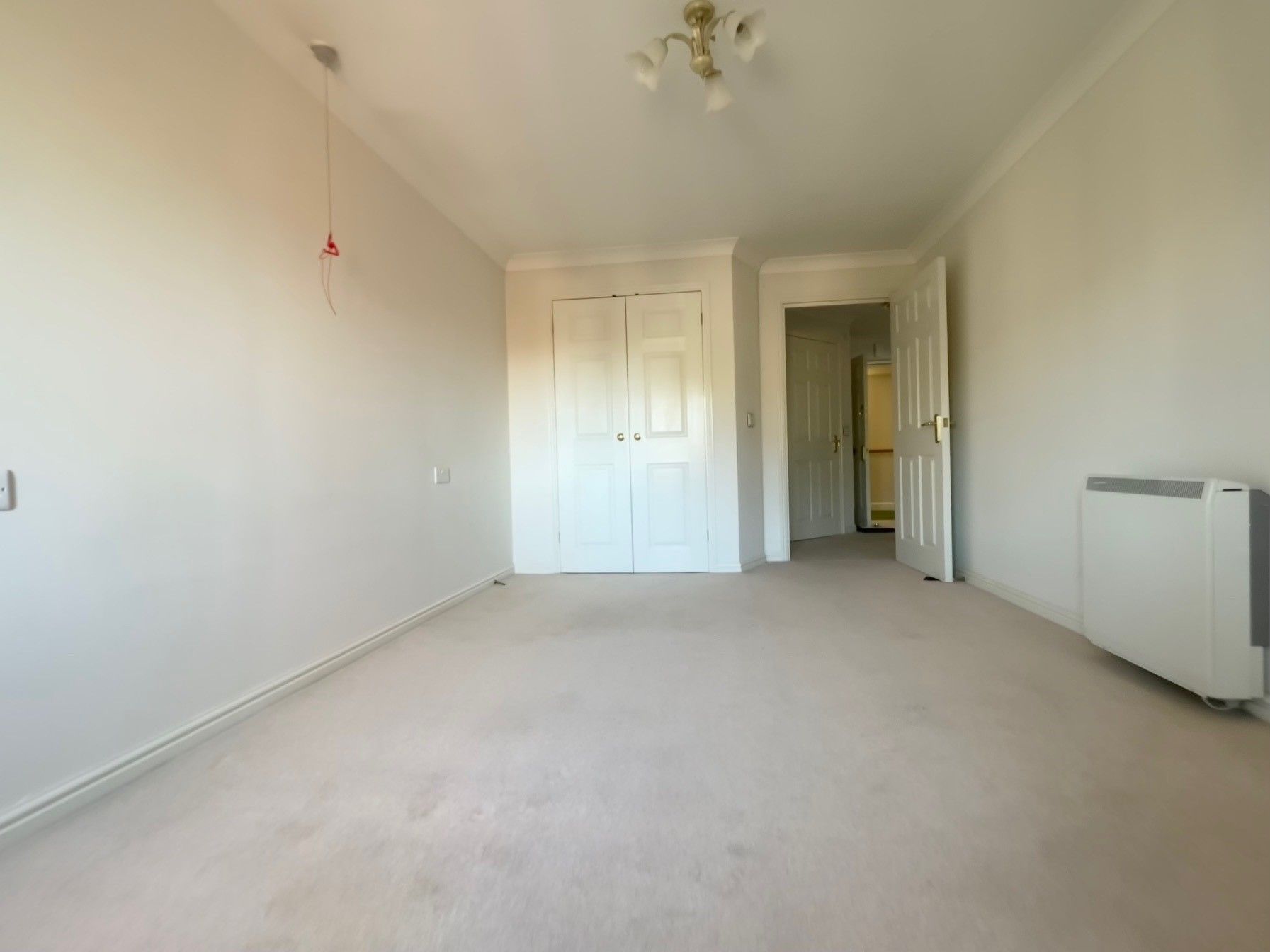 RESIDENTIAL INVESTMENT: A VACANT ONE BEDROOM SECOND FLOOR RETIREMENT APARTMENT CONSIDERED TO BE SUBSTANTIALLY BELOW CURRENT MARKET VALUE