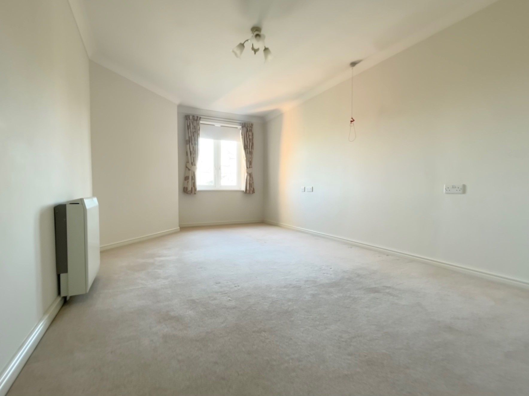 RESIDENTIAL INVESTMENT: A VACANT ONE BEDROOM SECOND FLOOR RETIREMENT APARTMENT CONSIDERED TO BE SUBSTANTIALLY BELOW CURRENT MARKET VALUE