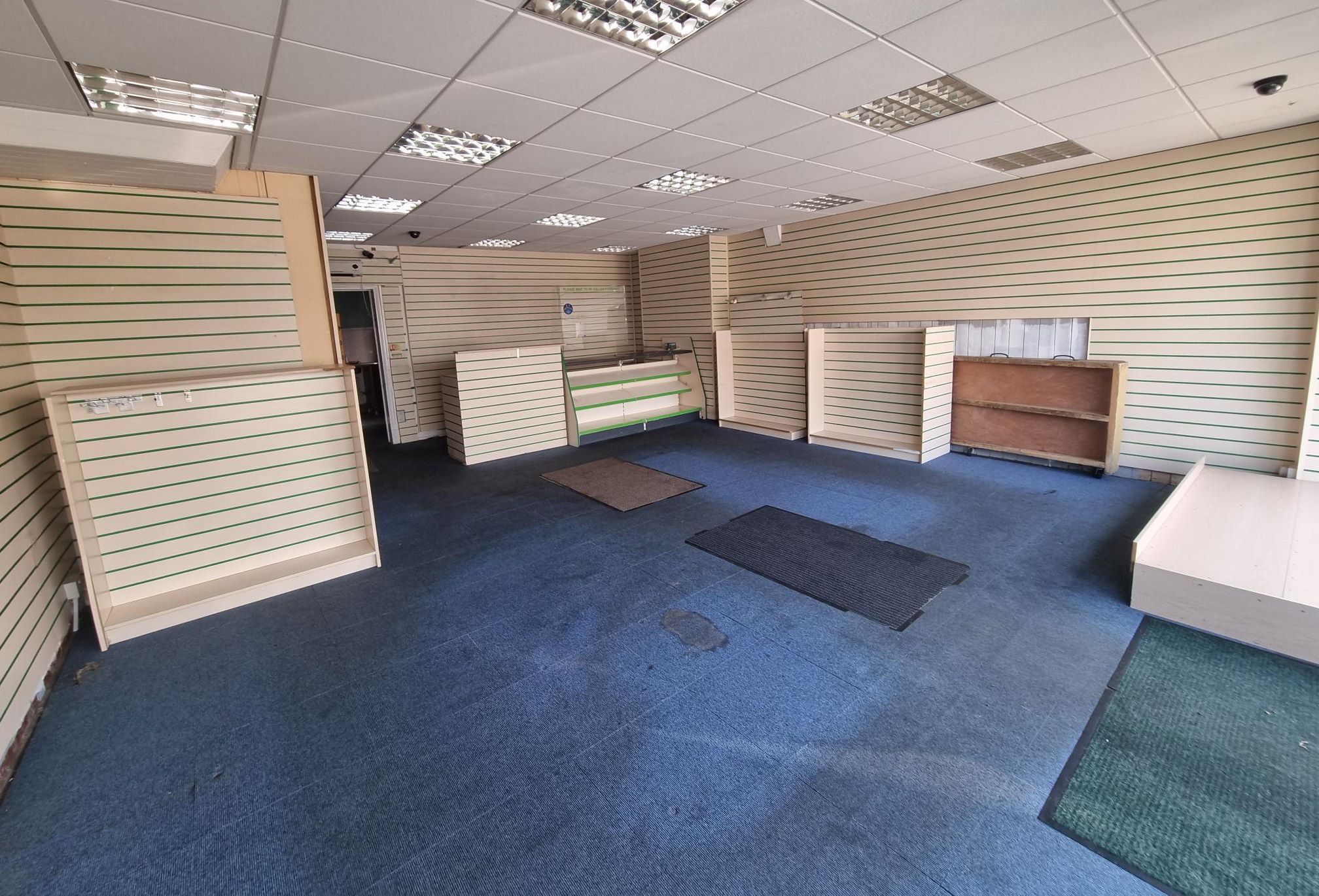 COMMERCIAL PROPERTY: A VACANT FREEHOLD LOCK UP SHOP LOCATED CLOSE TO THE HIGH STREET CONSIDERED TO BE AN EXCELLENT BUY TO LET INVESTMENT