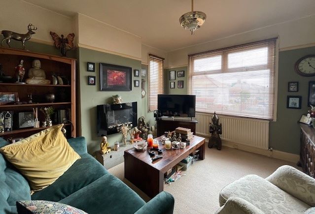 BUY TO LET INVESTMENT: A FREEHOLD PROPERTY ARRANGED AS TWO SELF-CONTAINED FLATS BOTH LET AND PRODUCING A COMBINED INCOME OF £14,400 PA
