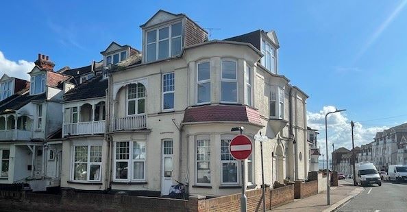 RESIDENTIAL INVESTMENT: A SUBSTANTIAL FREEHOLD BUILDING WITH CAR PARK USED AS A HOUSE OF MULTIPLE OCCUPANCY COMPRISING 9 STUDIOS AND 10 ROOMS