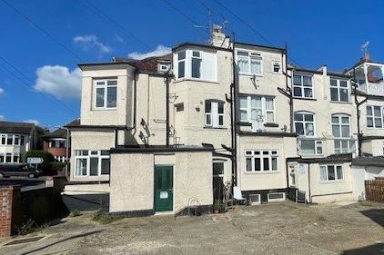 RESIDENTIAL INVESTMENT: A SUBSTANTIAL FREEHOLD BUILDING WITH CAR PARK USED AS A HOUSE OF MULTIPLE OCCUPANCY COMPRISING 9 STUDIOS AND 10 ROOMS