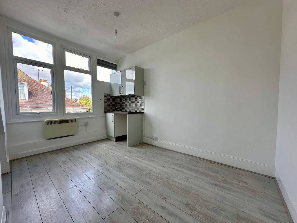 RESIDENTIAL INVESTMENT: A SUBSTANTIAL FREEHOLD BUILDING WITH CAR PARK USED AS A HOUSE OF MULTIPLE OCCUPANCY COMPRISING 9 STUDIOS AND 10 ROOMS